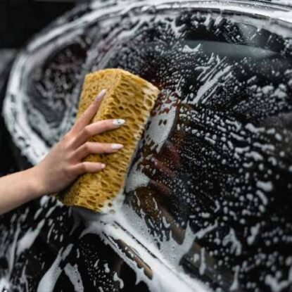 Black car is being cleaned